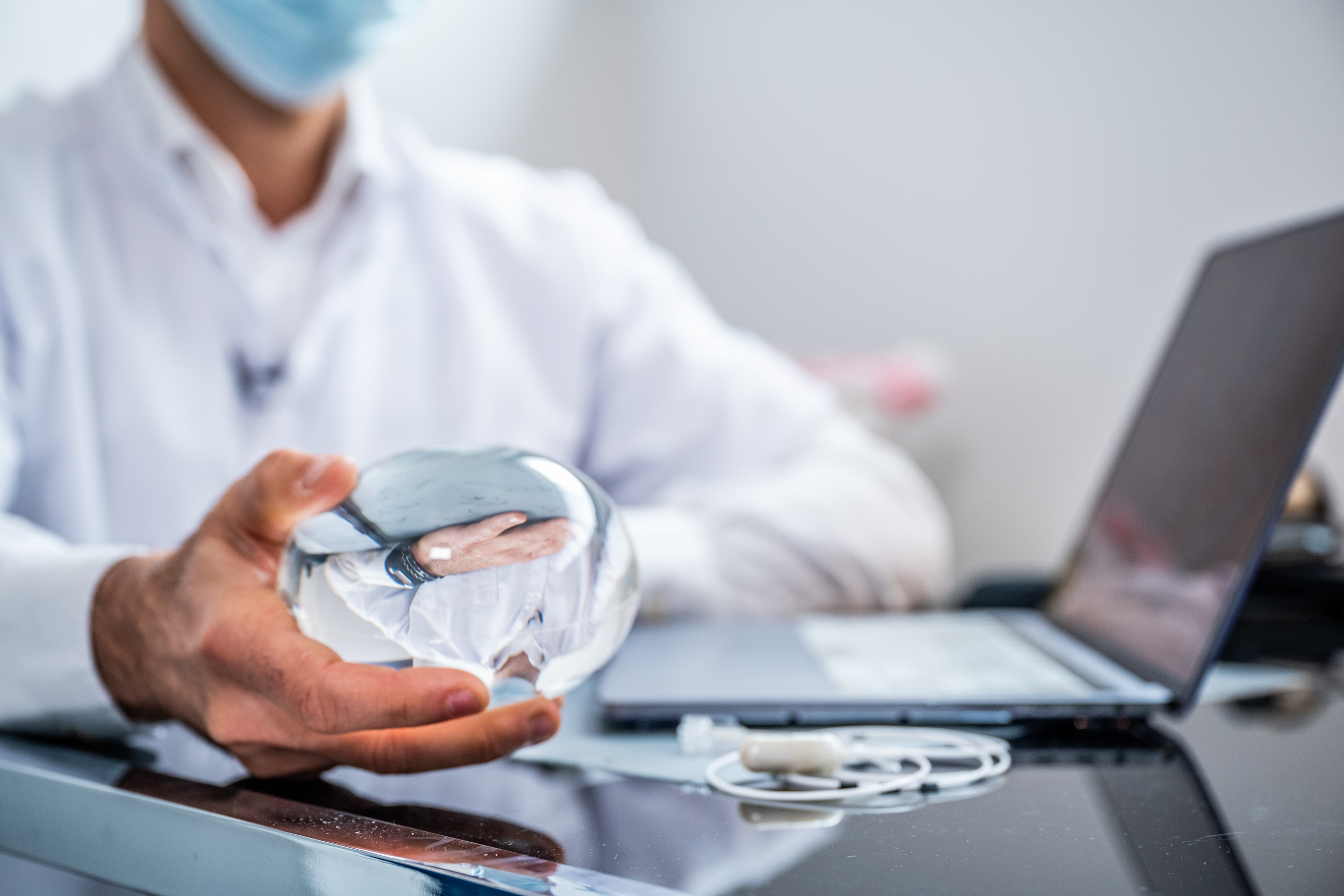 image of doctor holding the balloon