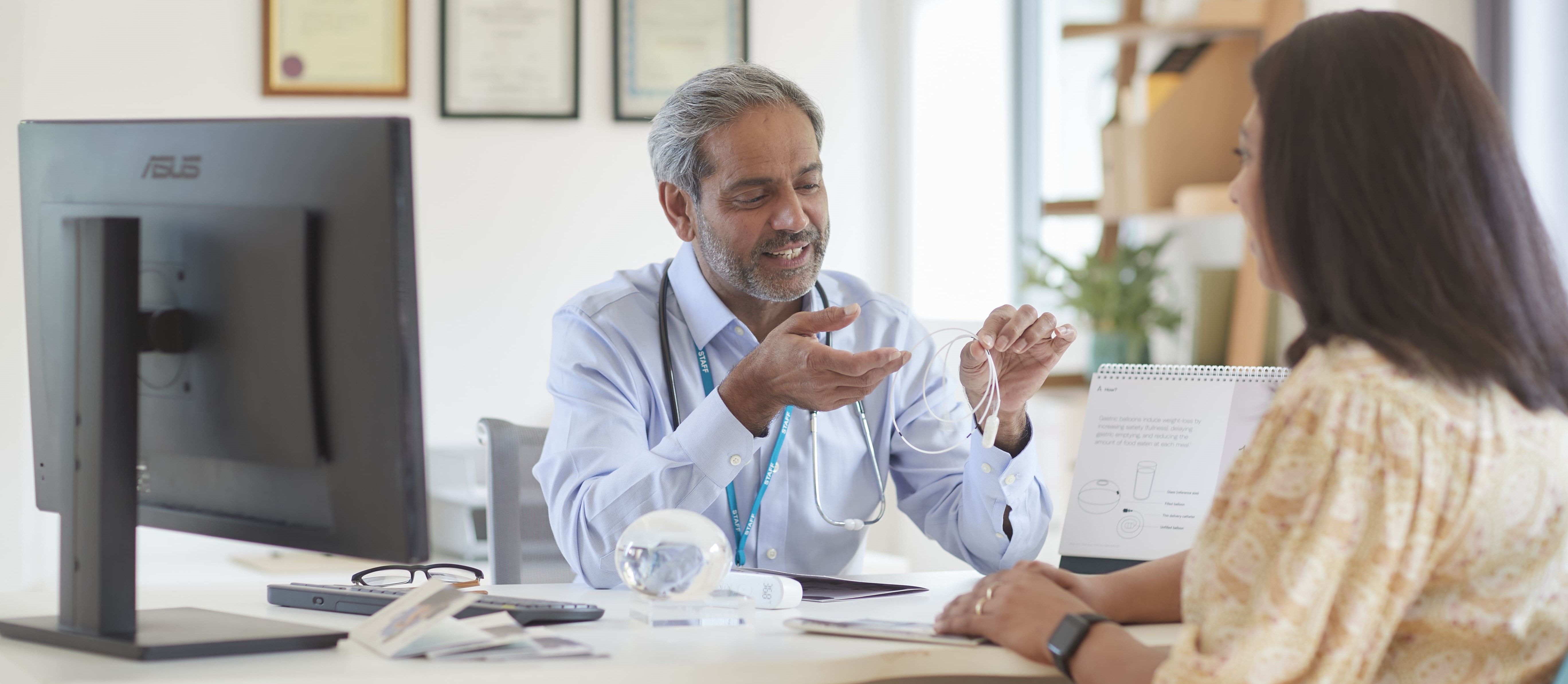 Dr with his patient talking about the Allurion Programme