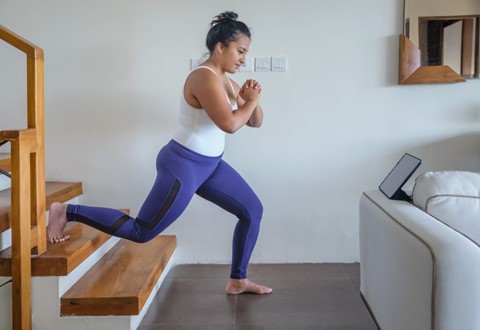 An Allurion Program patient is exercising and see her weight loss progress