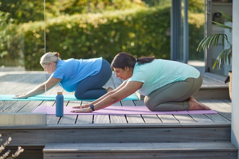 Women exercising yoga