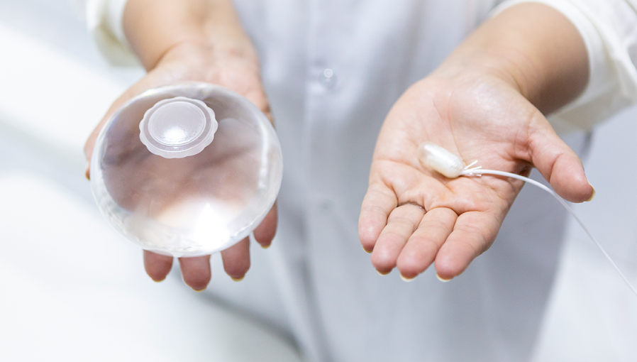 A doctor with the Allurion gastric balloon in his hands