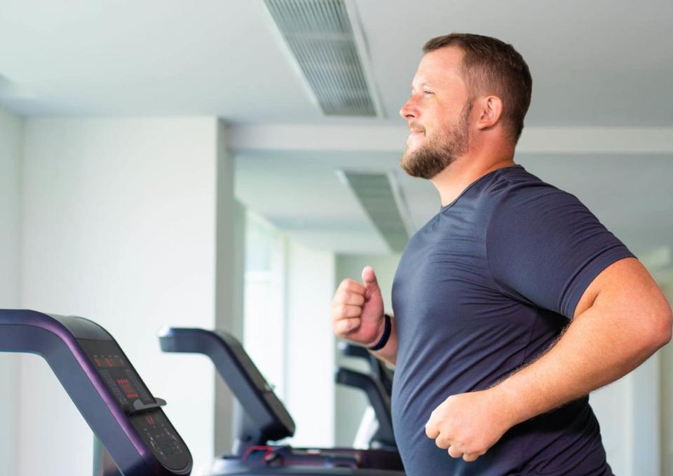 A man running on a treadmill.